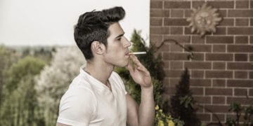 guy smoking a cigarette